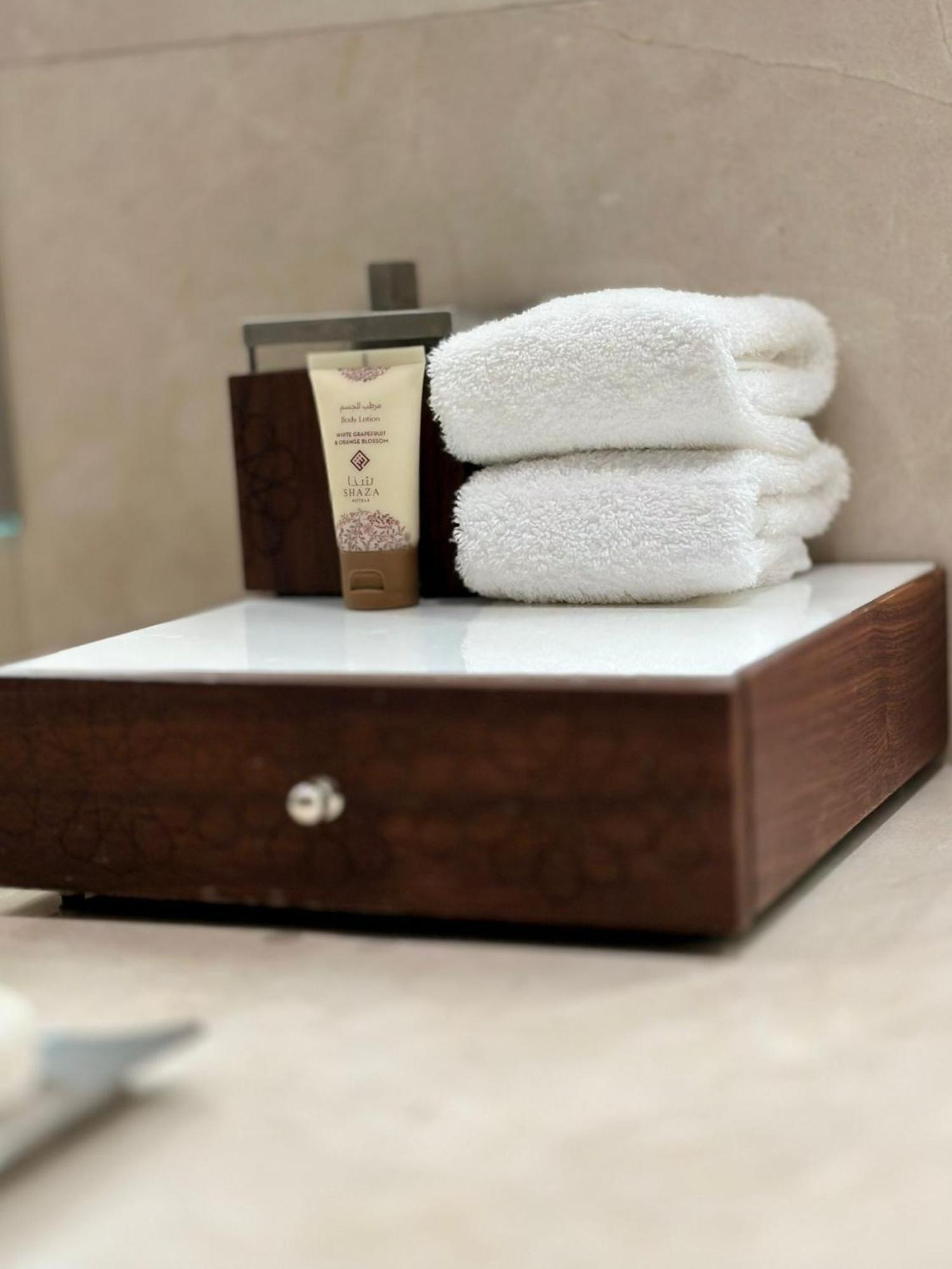 Shaza Doha Hotel ภายนอก รูปภาพ A drawer with a towel and soap